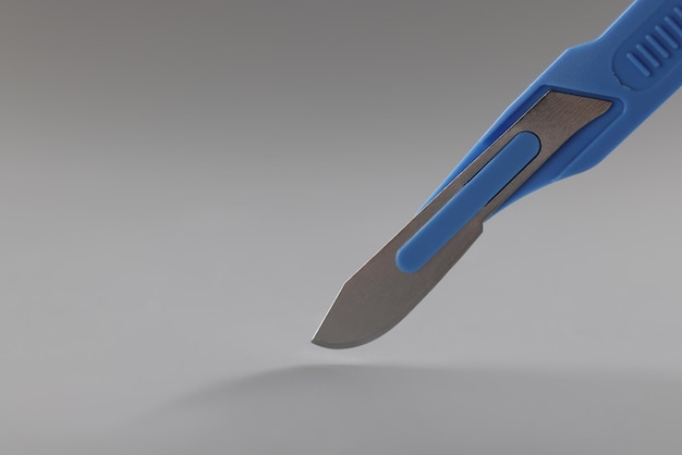 Retractable pocket sized box cutter blue colour knife sharp equipment