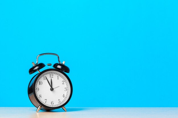 retro alarm clock on table