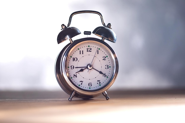 Retro alarm clock on table