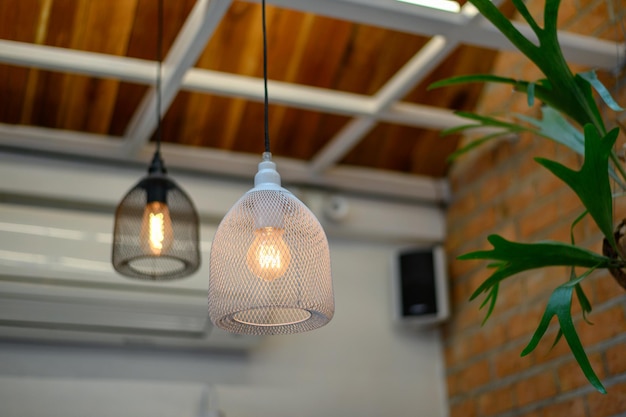 Retro bright lamp hanging on ceiling