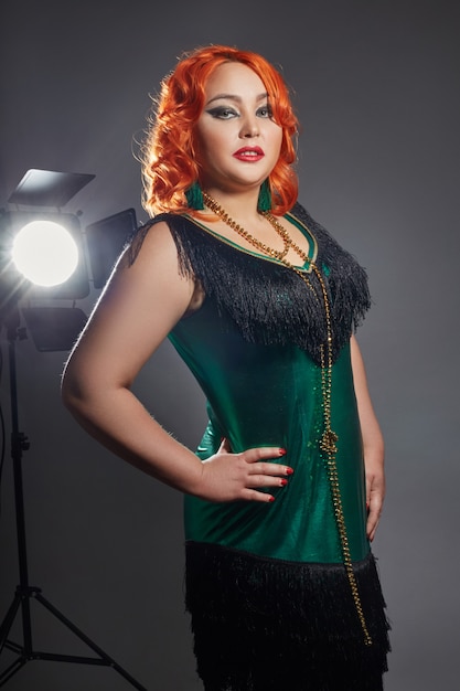 Retro cabaret plump woman with red hair 