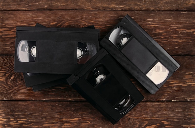 retro cassettes on a wooden background