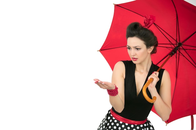 Retro girl with red umbrella look weather