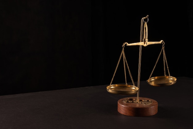 Retro law scales on table. Symbol of justice.