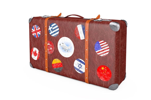 Retro Leather Brown Threadbare Suitcase With Travel Stickers, Metal Corners and Belts on a white background. 3d Rendering