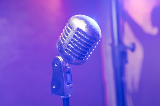 Retro microphone on stage in a pub or american bar restaurant during a night show