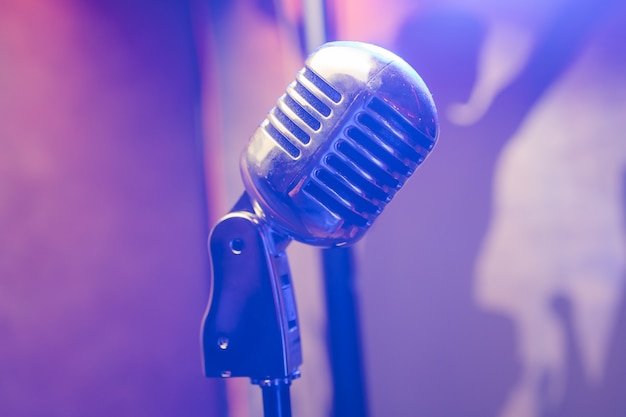 Retro microphone on stage in a pub or american bar restaurant during a night show