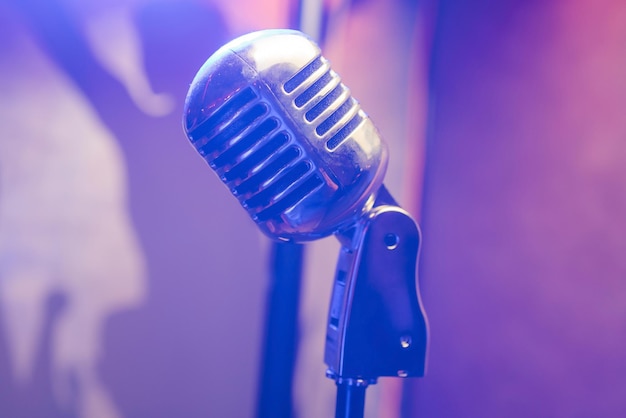 Retro microphone on stage in a pub or american bar restaurant during a night show