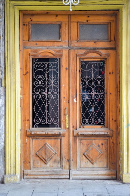 Retro old doors on the street. Colored doors. brown door backdrop. door background