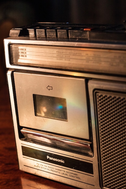 Retro outdated portable stereo boombox radio receiver with cassette recorder from circa late 70s. Vintage old style filtered photo.