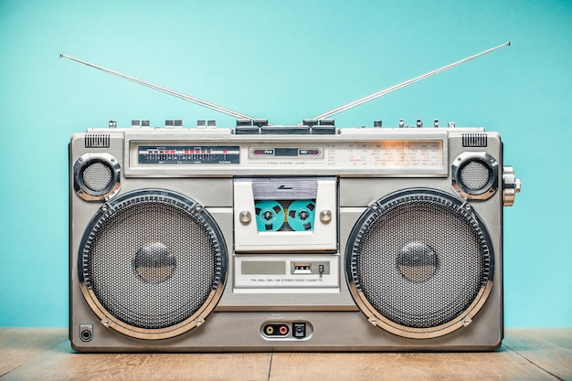 Photo retro outdated portable stereo boombox radio receiver with cassette recorder from circa late 70s