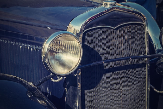 Retro photo of the vintage car closeup