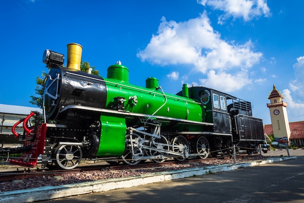 Retro steam train with  blue sky cloud.