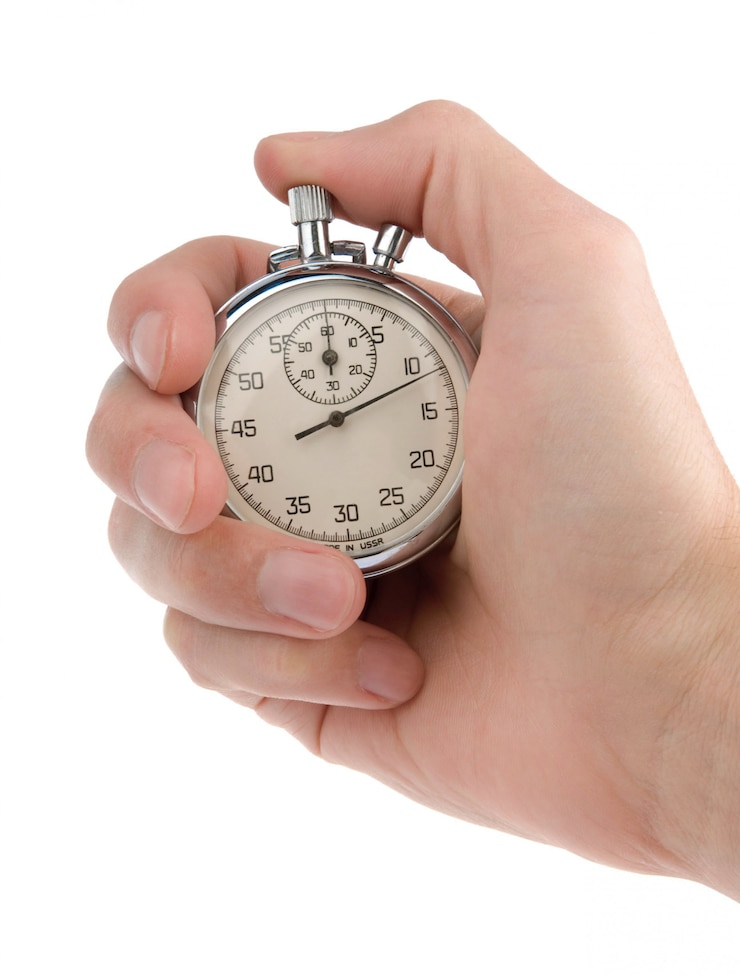 Photo retro stopwatch in a hand