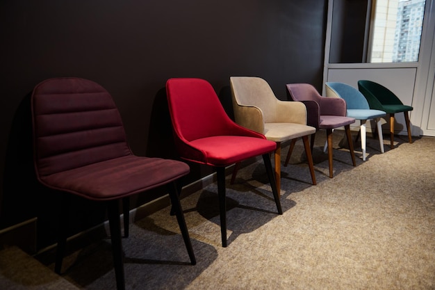 Retro style colorful chairs on dispay for sale in the furniture store showroom