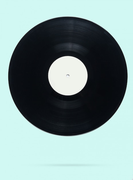 Retro style vinyl record on blue pastel