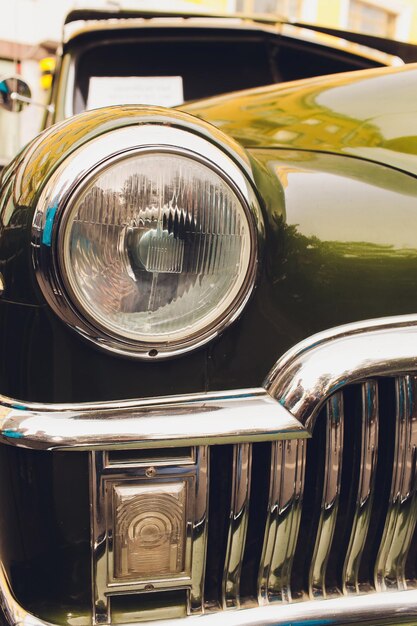 Photo retro styled image of a front of a classic car