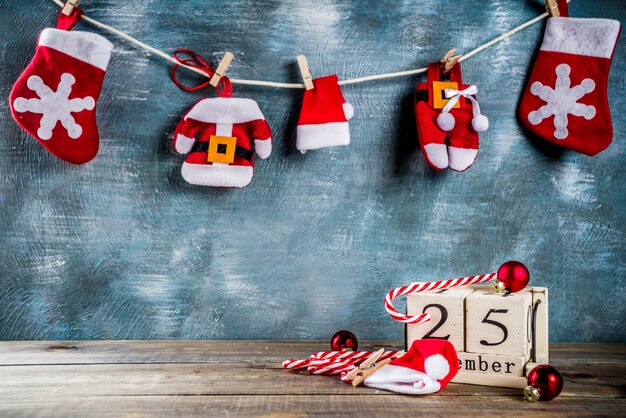 retro styled wooden calendar candy cane and Santa clothes