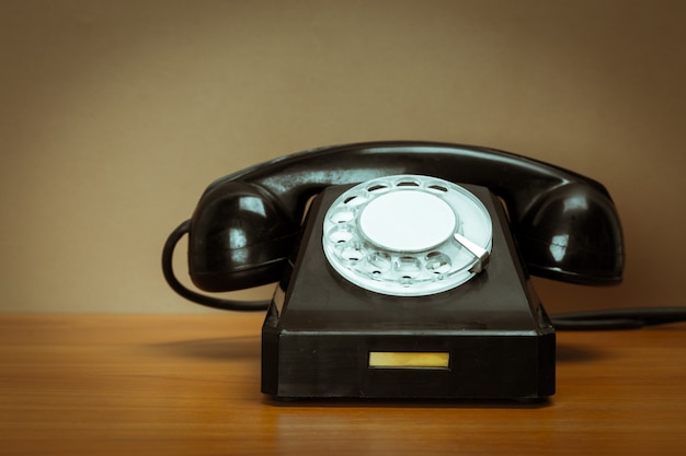 Retro telephone on table