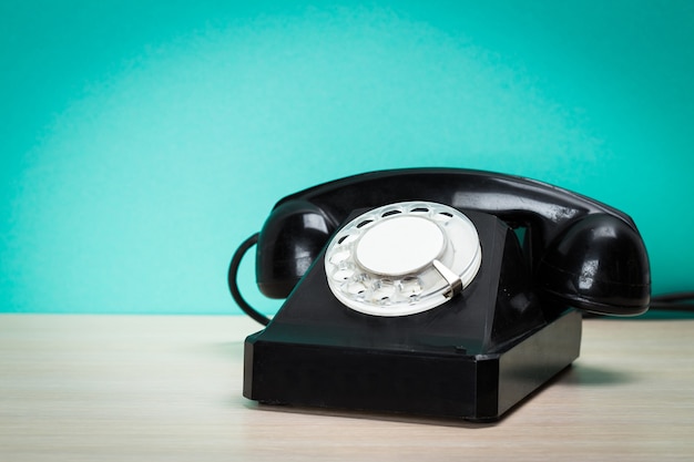 Retro telephone on table