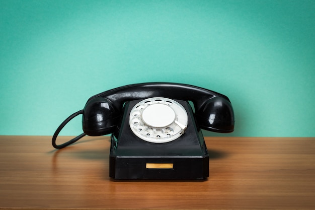 Retro telephone on table