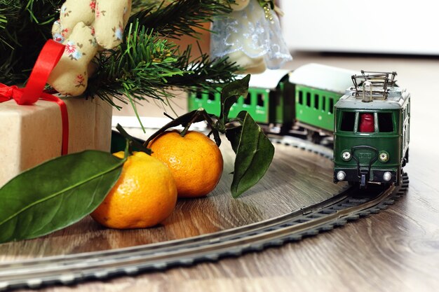 Retro train under tree gift