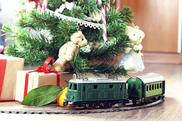 Retro train under tree gift