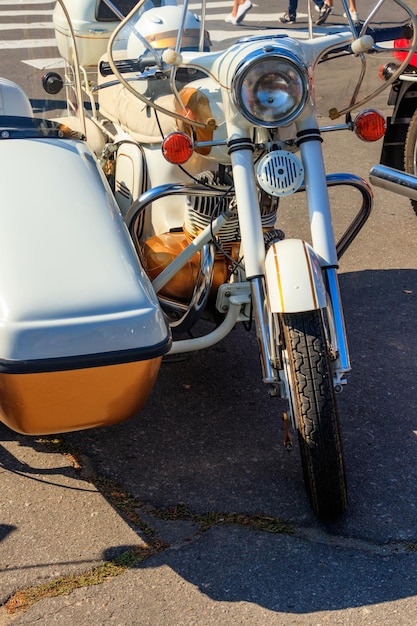 Retro tricar Threewheeled motorcycle on city street