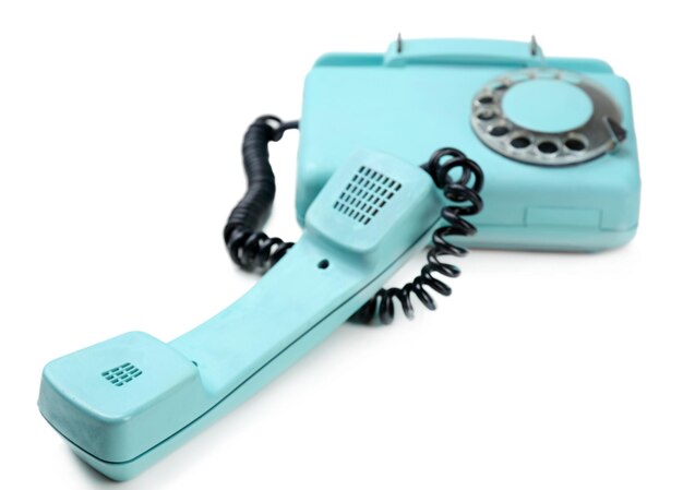 Retro turquoise telephone close up