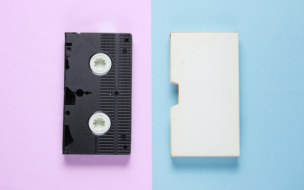 Photo retro video cassette with cover on color paper