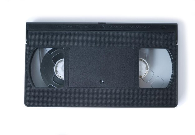 Retro videotape on white background, close-up isolate.