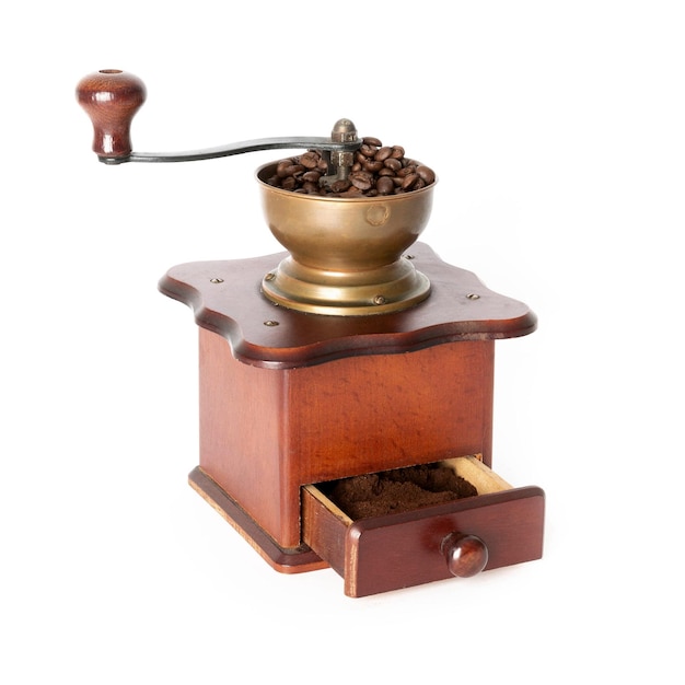 Retro wooden coffee mill on the white background