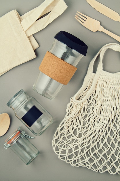 Reusable bags, glass jars and coffee mug for plastic free and zero waste lifestyle