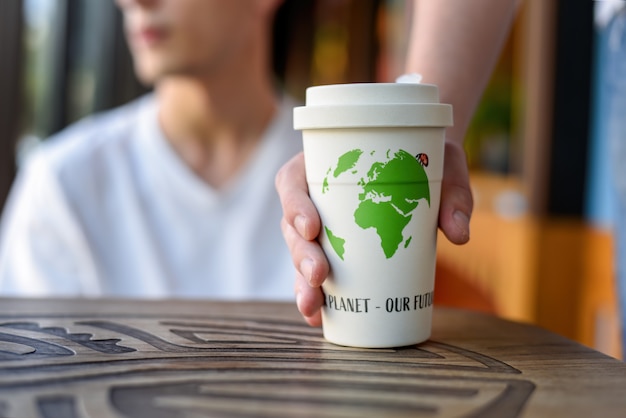 Reusable bamboo cup of coffee