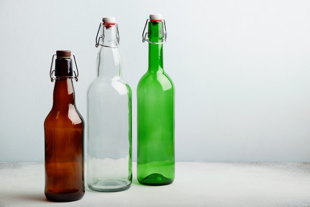 Reusable glass bottles on table