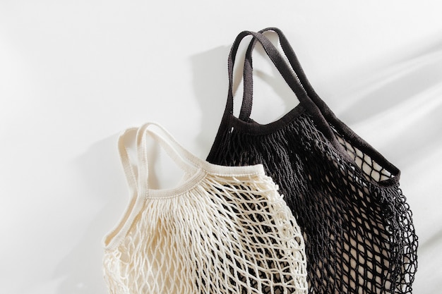 Reusable mesh bags on white background. Sustainable lifestyle concept.