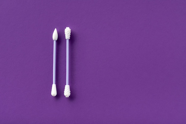 Reusable silicone swab buds on purple surface