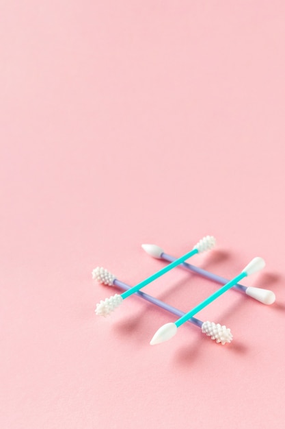 Photo reusable silicone swabs on pink surface