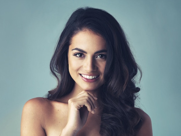 Revitalize your natural beauty Cropped shot of a beautiful young woman posing in the studio