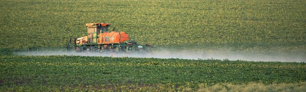 Revitalizing the Fields A Tractor Sprayer at Work