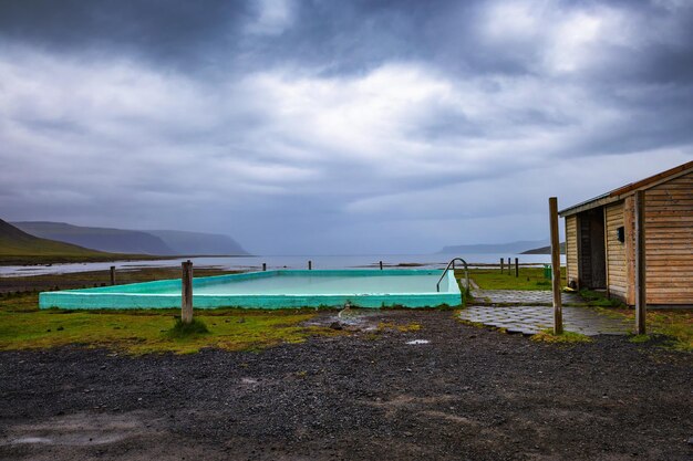 Reykjafjardarlaug hot pool located in the westfjords iceland