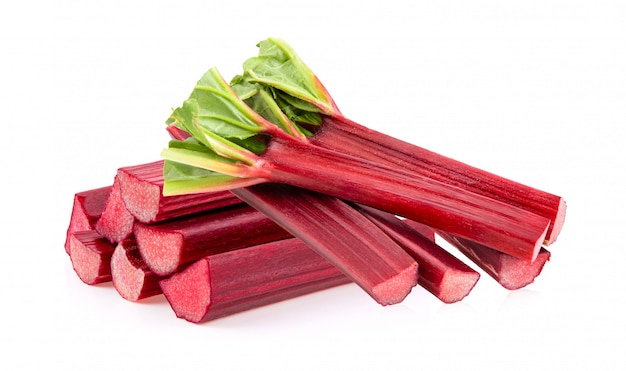 Rhubarb stalks on a white wall