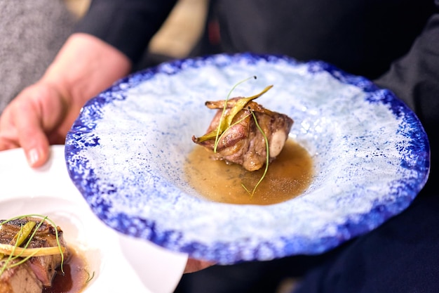 Rib of beef slowly cooked on a plate ready to be served