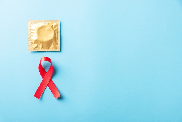 Ribbon symbol for HIV AIDS awareness with condom