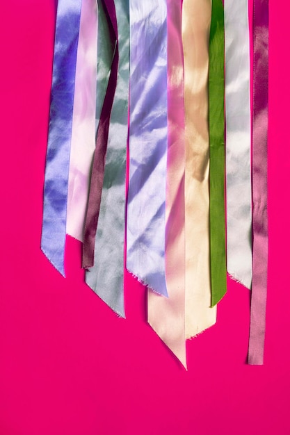 Ribbons on fuchsia background