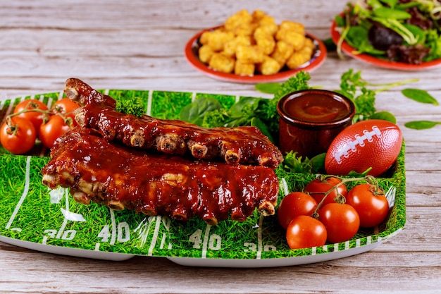 Ribs with tomato for American football party concept