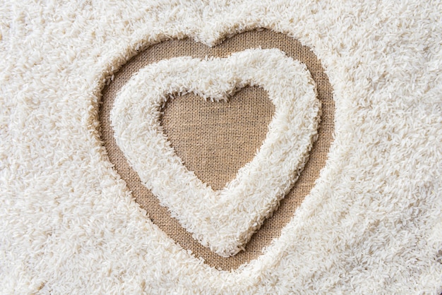 rice background Space in the middle of a heart. sackcloth is background