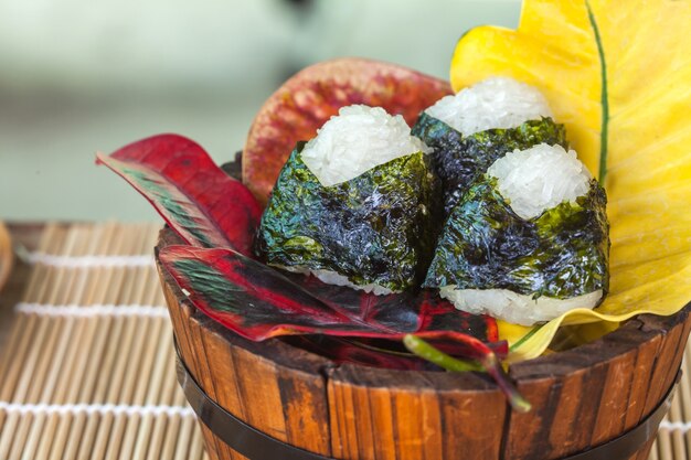 rice ball food design in wood bucket 