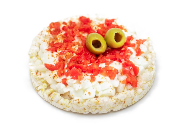 Rice cake sandwich with bell pepper cottage cheese and olives