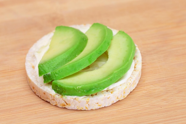 Rice cake sandwich with fresh avocado and cream cheese